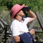 Woman looking through binoculars