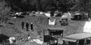 Cars and campers in a meadow in Yosemite Valley. Cars and campers in a meadow in Yosemite Valley.