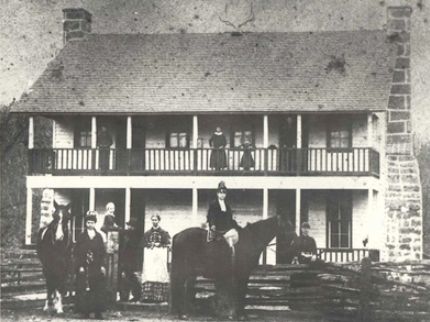 c. 1880s photo of the Cox family in front of the tavern