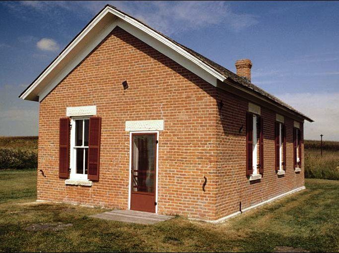 Photo of desks and stove inside the Freeman School