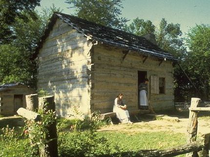 Reconstructed log cabins at living historical harm of Lincoln Boyhood Home National Memorial