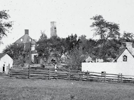 Wartime photo showing destroyed Mumma family buildings