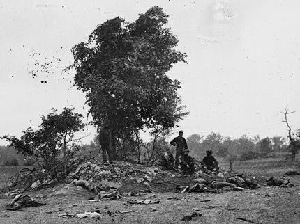 Wartime photo of soldiers awaiting burial at the West Woods