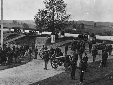 Photo of the officers and men of Company F, 3rd Massachusetts Heavy Artillery in Fort Stevens in 1865