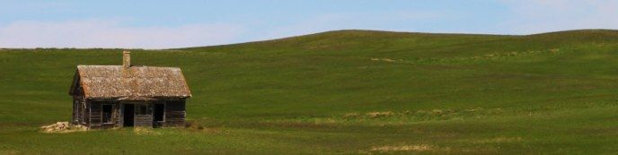 Photo of a prairie homestead.