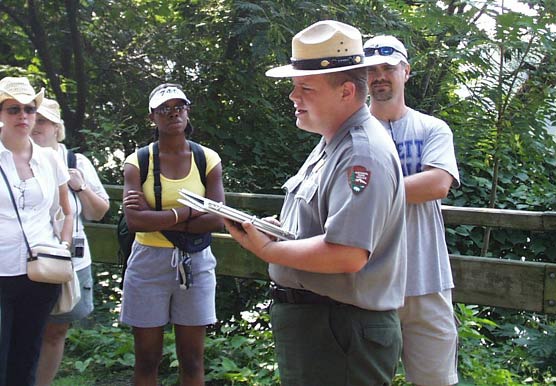 A ranger leads a tour of Belle Isle on Richmond's river front.