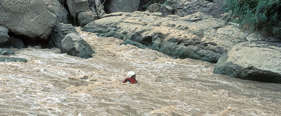Boater up to his neck in water