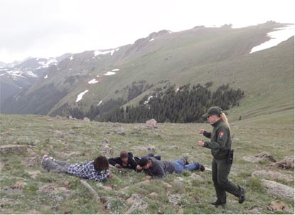 2011 Teacher-Ranger in the tundra with students.