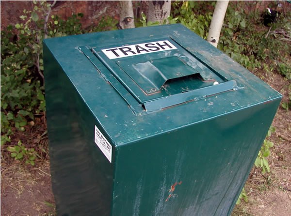 a photo of bear-proof trash can