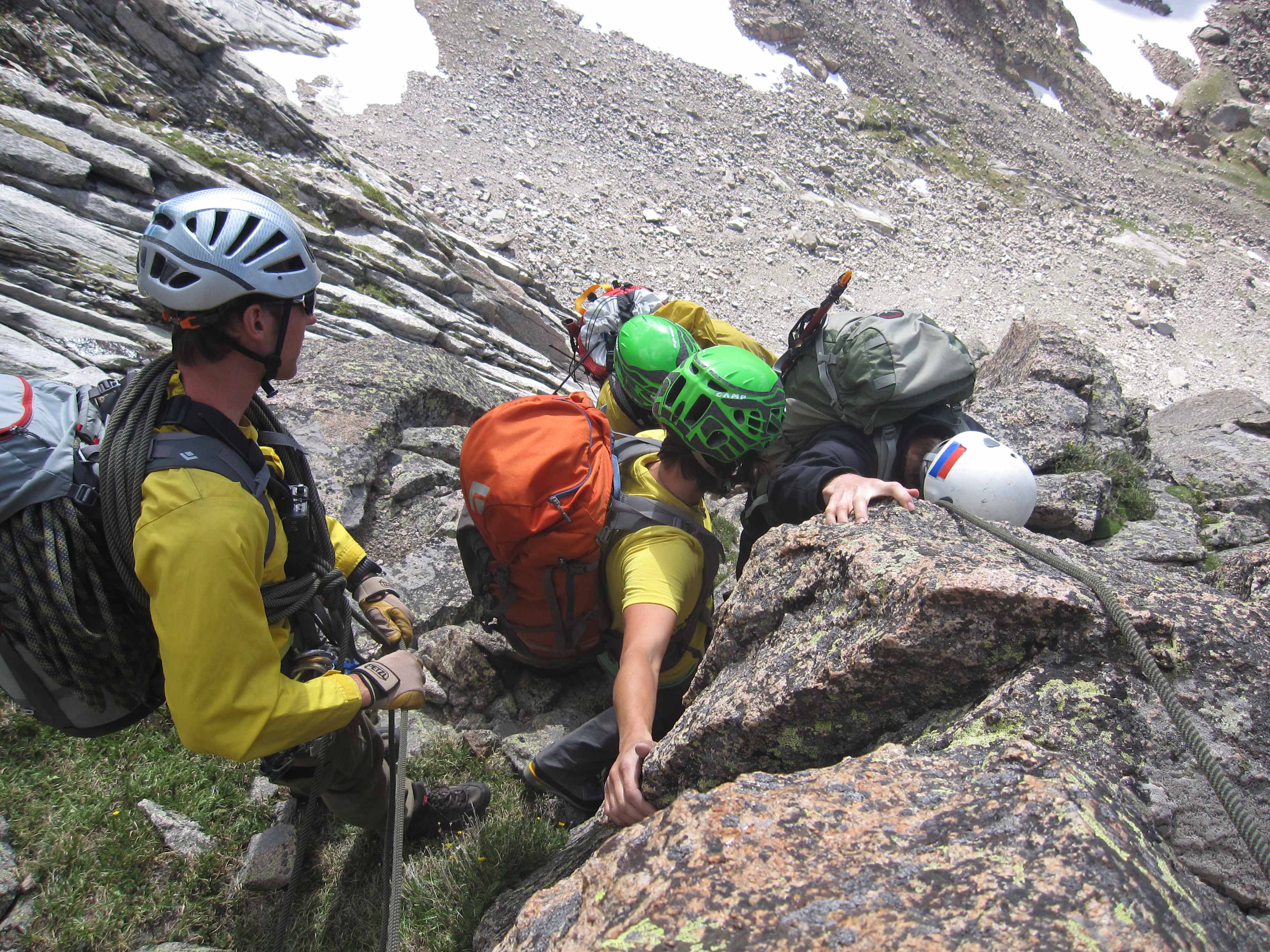 Rescuers and Lambert traverse narrow steep ledge (3)