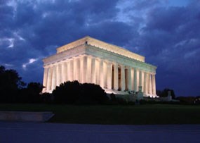 Lincoln Memorial glowing with lights at night in Washington DC