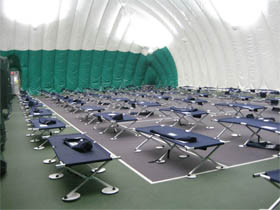Photo The Tennis Bubble houses 250 cots for NPS employees.