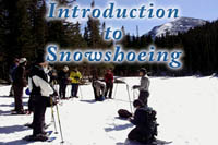 Photo ranger instructing visitors how to snowshoe on Introduction to Snowshoeing icon