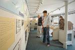 12 Visitors at exhibit