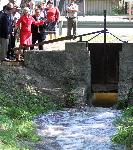 Sen. Kay B. Hutchison Opening the Acequia Gate at Mission San Juan Capistrano