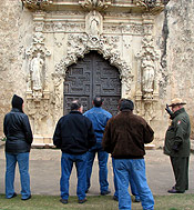 Ranger-guided tour stopping in front of Mission San José's church Ranger-guided tour stopping in front of Mission San José's church