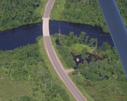 Aerial view ofCounty T Landing in Flood: Water is in the parking lot and was to the underside of the bridge