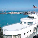 The Aquatic Park Bathhouse Building with Hyde Street Pier in the background.