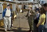 Park Ranger conducting a tour on Balclutha