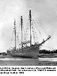 Thayer with her sails lowered and aground.