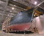 Thayer is positioned in the old seaplane hangar