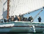 Captain Al and volunteers on scow schooner ALMA