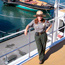 Park Ranger standing on the upper deck of ferryboat EUREKA.