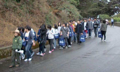 Group of students walking in the Fort Mason area.