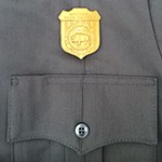 NPS uniform pocket with gold badge