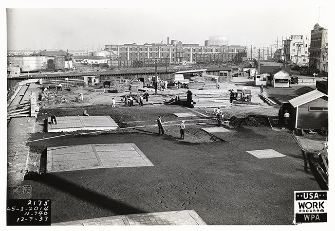 A black and white photo taken in 1937 of the area just east of the Bathhouse building.