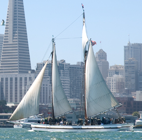 A two-masted scow schooner sailing on SF Bay.