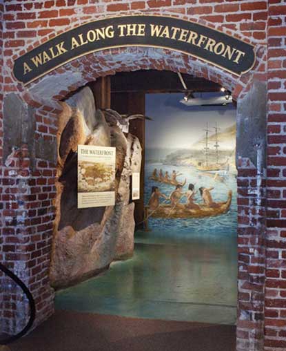 The brick entrance archway to an exhibit in the visitor center.