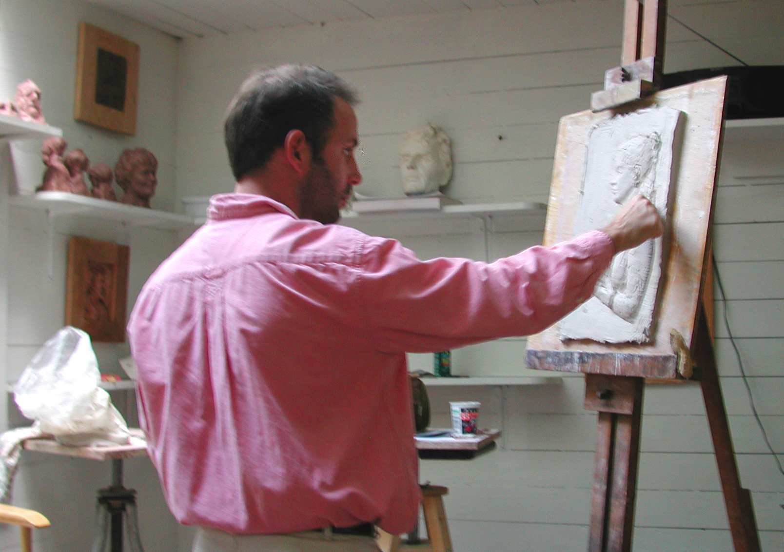 Sculptor-in-Residence, Larry Nowlan, working on a relief Sculptor-in-Residence, Larry Nowlan, working on a relief