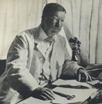 TR at his desk in the Library at Sagamore Hill.
