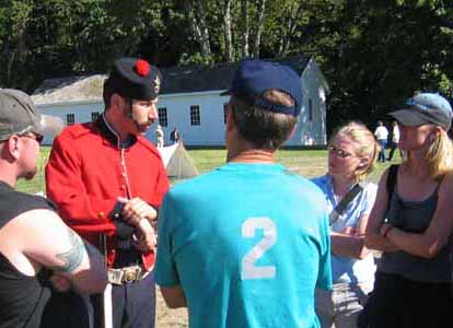 Simon Sherwood talks with visitors.