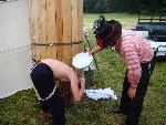 Brad Smith helps his son Conner with a wash.