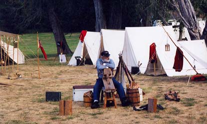NPS Volunteer Dave Williams holds down the fort at an empty camp ground.