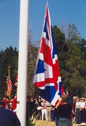 The Union flag is raised during the ceremony commorating the 1998 gift of an 80-foot flagpole by the people of the United Kingdom.