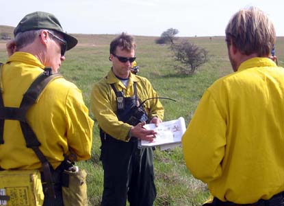 Fire crew discussses prescribed burn