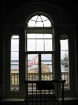 a view looking through the window to the wharves