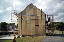 Pedrick store house covered with plywood