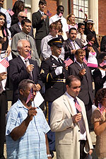 New citizens waving their flags, Sept 18, 2006.
