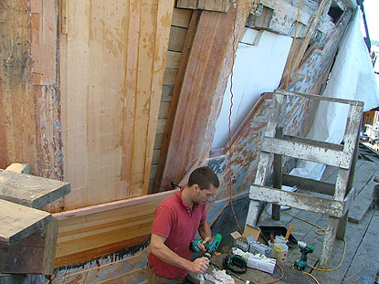 a view from the front of the ship, showing the new planking that is being installed