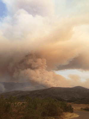 Smoke from the 2013 Springs Fire adds significant amounts of particulate and smoke into the air.