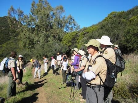 Hikers pause to discuss the complexities of the Santa Monica Mountains