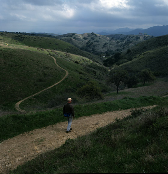 A hiker takes a stroll along one of the many winding trails that make-up the Chesseboro Canyon landscape.