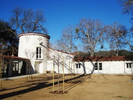 Seen with the new courtyard design, the visitor center still retains the historic look of the building.