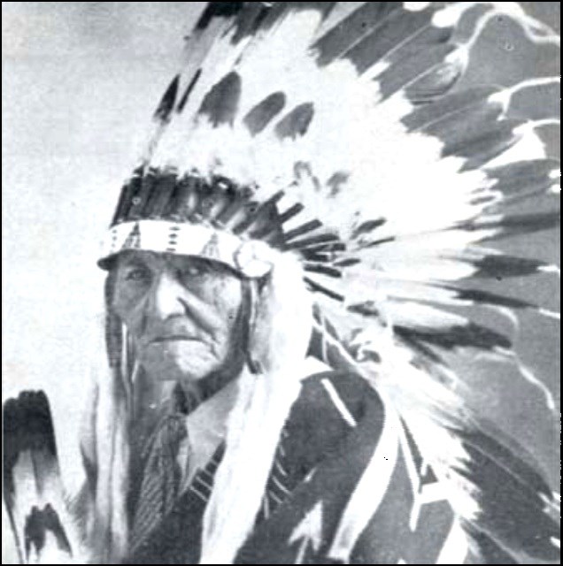 Stacy Riggs circa 1937 in traditional clothing and head dress.