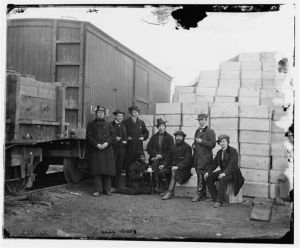 Commissary agents with boxes of food