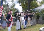 Re-enactors fire volley